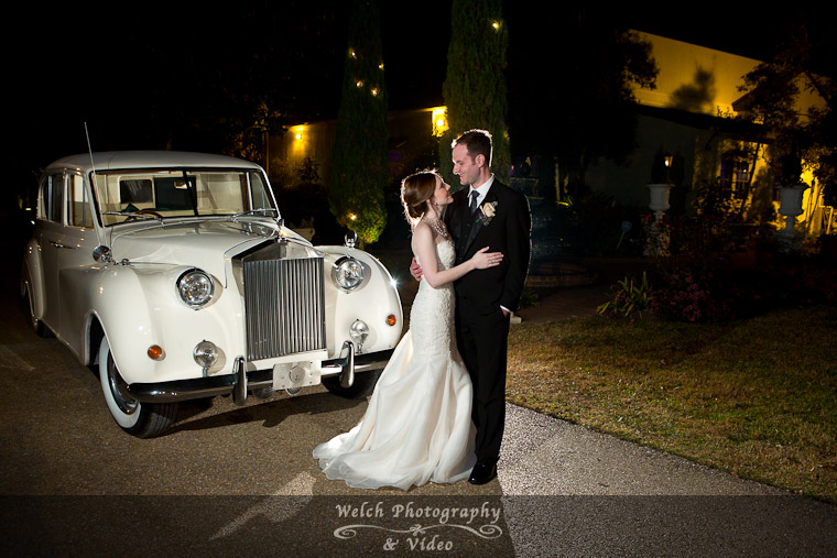 Bride and groom with limo
